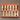 Set of wooden-handled chisels in a red box on a white background